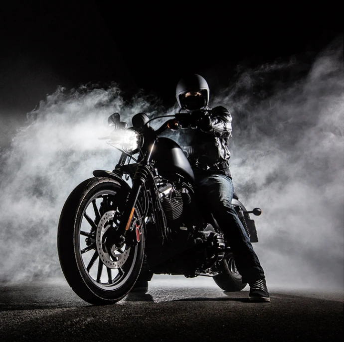 cool looking man on a vortex motorcycle